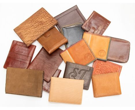 Sixteen various recent and vintage gentleman's crocodile wallets in tan and brown tones. (16)Condition: some signs of use to 
