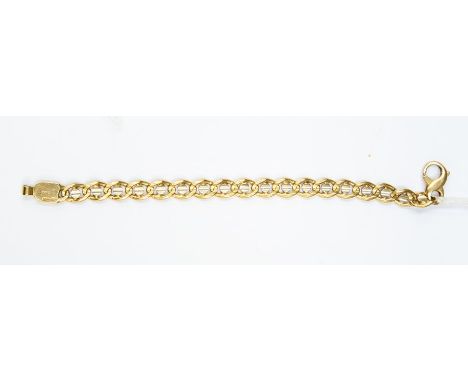 A two tone 9ct gold bracelet, fancy oval open links set to the centre with white gold discs, trigger clasp, length approx. 19