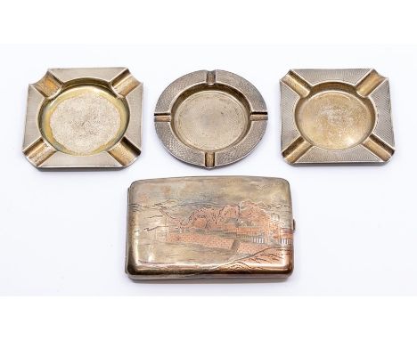 A Japanese copper inlaid white metal cigarette case, Taisho period, of cushion form and worked with a coastal landscape with 