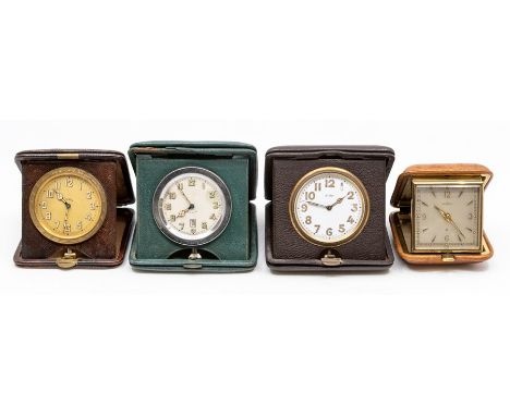 Three leather cased travel clocks, the Swiss eight day 'pocket watch' movements in square cases, 9-10.5cm (dials 5cm), togeth