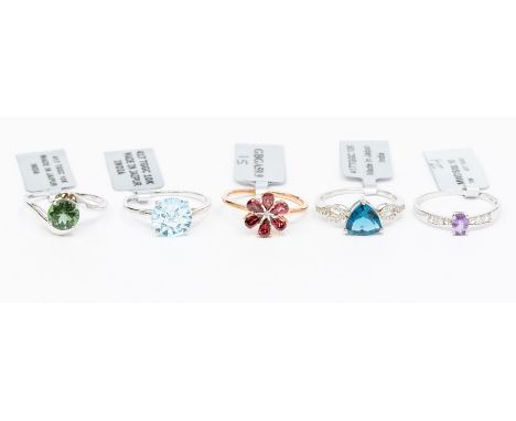 A collection of five 9ct gold rings to include, white gold and apatite, rose gold, red spinel and white zircon, white gold, b