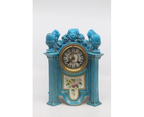 A Sevres style porcelain mantel clock, circa 1890, of canted square architectural form with corner pilasters surmounted by eg