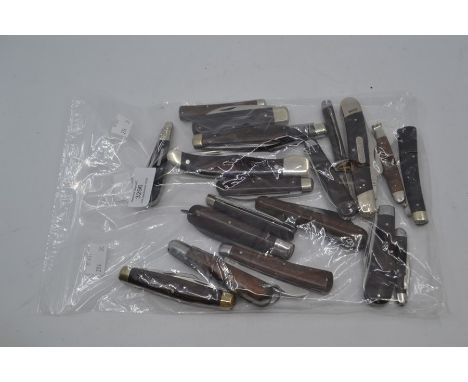 Twenty various vintage wood-handled folding pocket knives. (20)