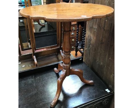 A 19th Century mahogany tilt top tripod table, a further mahogany tripod table with fixed top and another mid 19th Century pe