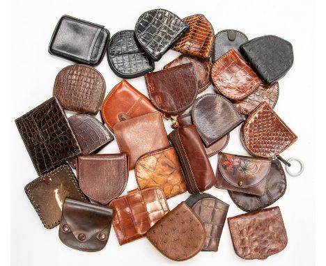 Thirty various recent and vintage leather and crocodile gentleman's coin holders. (30)Condition: some unused, others showing 