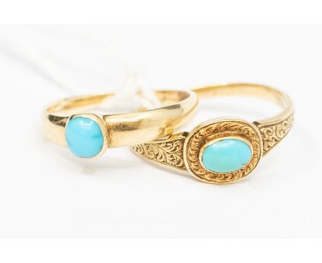 Two early 20th century turquoise rings to include an oval set turquoise within an engraved border, further decoration to the 