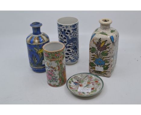 An assembled group of Chinese and Near Eastern ceramics, 19th Century, to include a blue and white sleeve vase decorated with