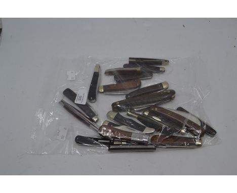 Twenty various vintage wood-handled folding pocket knives. (20)