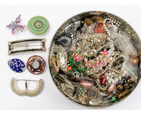 A collection of costume jewellery to include vintage paste set clip on earrings, necklaces, glass bead necklaces, enamel broo