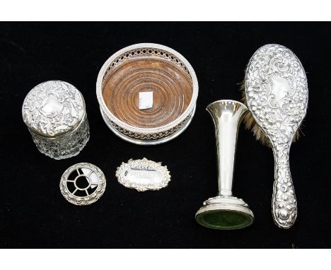 A group of silver to include silver mounted hairbrush, toilet bottle and silver cover and Modern Sherry bottle label, varius 