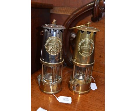 Two late 19th Century Eccles miners lamps, the name plates inscribed The Protector Lamp &amp; Lighting Co Ltd, one numbered 1