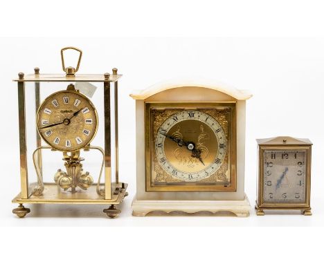 An Elliot alabaster-cased mantel clock, with gilt brass dial retailed by Cope of Nottingham, 15.5cm high, together with a Ger