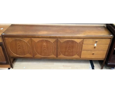 A Nathan Circles teak sideboard, circa 1975, fitted with two doors to centre, a fold down door to left and three drawers to r