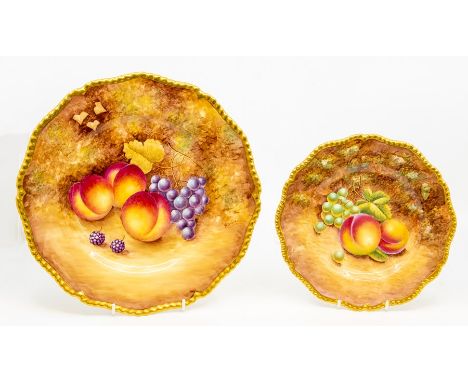 Two Royal Worcester hand painted cabinet plates, comprising large plated painted with a fruit scene of peaches, grapes and be