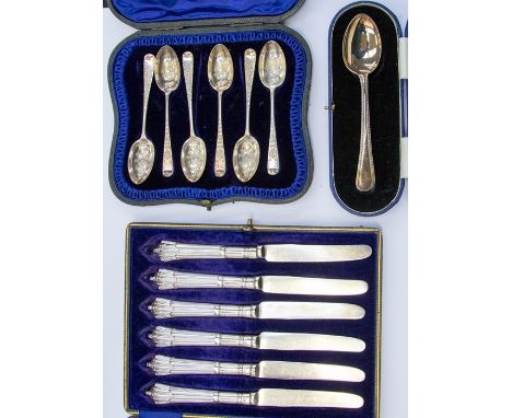 A collection of cased silver flatware to include: A set of six Edwardian engraved tea spoons, with floral decoration, by Josi