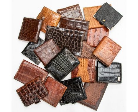 Twenty various recent and vintage gentleman's crocodile wallets, including a Dunhill example. (20)Condition: varying signs of