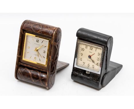 A Favre-Leuba crocodile cased travel alarm clock, the eight day movement in a dark brown folding case, 12cm (dial 5cm), toget