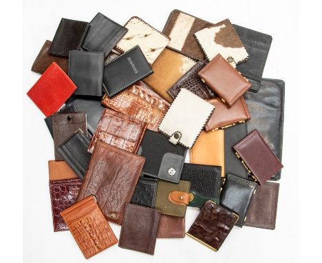 A collection of recent and vintage leather and crocodile Gentleman's accessories, including wallets, business card holders, p