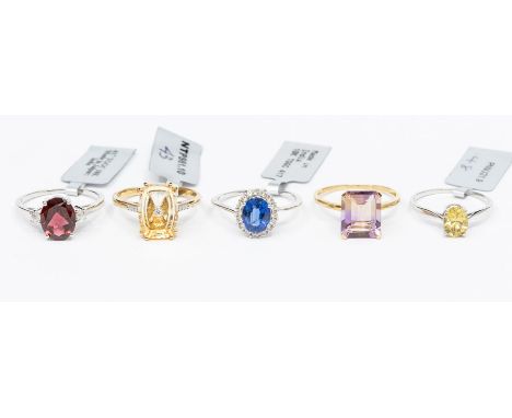 A collection of 10ct yellow and white gold and gem set rings to include  a Lehrer Torus citrine and diamond ring in yellow go