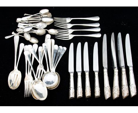 A collection of silver flatware to include: a part Elizabeth II hanovarian with rat tail dinner service - 4 table forks, 4 de