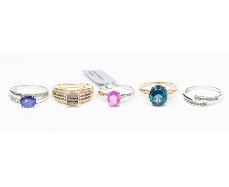 A collection of 9ct gold and gem set rings to include three white gold rings, a pink sapphire and white zircon oval ring, an 