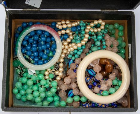 A collection of various vintage bead necklaces to include carved rose quartz, turquoise, mille fiori style beads, Art Deco gr