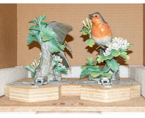 A pair of Royal Worcester figures of a Chaffinches, modelled by Dorothy Doughty, limited edition 33/250, with wood stand and 