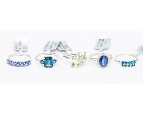 A collection of 9ct white gold rings to include a London blue topaz ring, total carat weight approx. 4.82cts,a canary kunzite