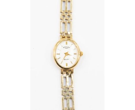 A 9ct gold ladies Rotary wristwatch, oval white dial approx. 14 x 17mm, gold tone baton markers, integral fancy link bracelet