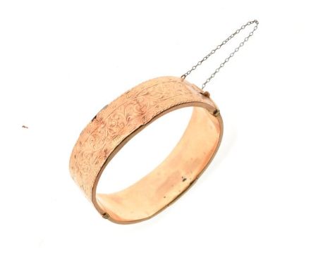 9ct gold snap bangle with engraved decoration, 21.5g approx   Condition: 