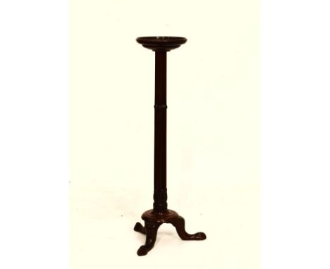 20th Century mahogany vase stand or torchère, the dished circular top on a six column cluster stem, circular base and tripod 