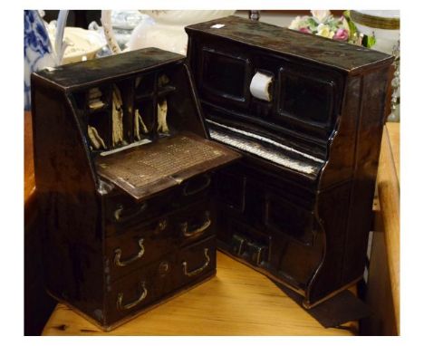 Glazed stoneware pottery model of a bureau, together with a similar model of a pianola, the latter 31cm high (2)   Condition: