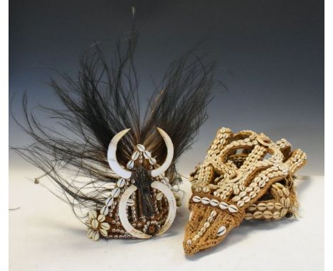 Ethnographica - Papua New Guinea men's and lady's head dresses, each decorated with cowerie shells   Condition: 