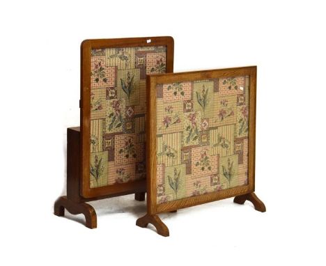 Early 20th Century folding firescreen/table with rectangular fabric panel beneath glass, together with an oak framed firescre