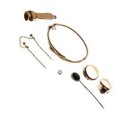 Yellow metal snap bangle set seed pearls, 5.4g approx gross, a 9ct gold mounted cigar piercer, two rings etc   Condition: 