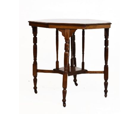 Late Victorian walnut octagonal occasional table on eight turned supports, X stretcher and central square under shelf on cast