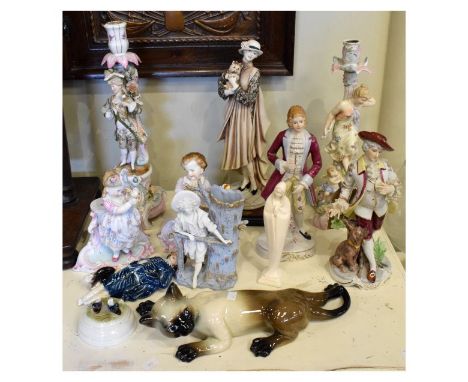 Assorted ceramic figurines to include; two German figural candlesticks, spill vase etc, together with a ceramic cat etc   Con