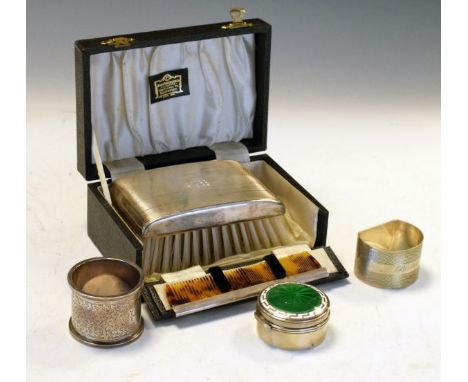 Edwardian silver and enamel patch/pill box of circular form, the hinged cover with radiating green enamel and white Greek Key