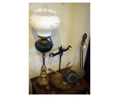 20th Century brass paraffin lamp with opaque glass shade and green reservoir, together with assorted scales   Condition: 