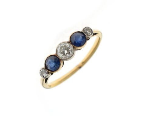 Yellow metal ring set three diamonds interspersed by blue stones, the shank indistinctly stamped 18, size K, 1.9g approx gros