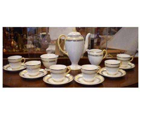 Early 20th Century Wedgwood coffee service for size settings comprising: ovoid coffee pot, milk, sugar, six cups and saucers,