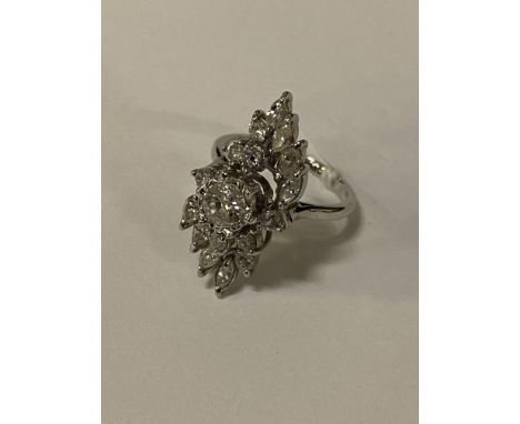 WHITE GOLD &amp; DIAMOND RING - CENTRE STONE APPROX:0.65 CARAT WITH 16 SMALLER STONES SURROUNDING SIZE L