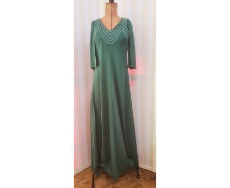 1970's and later dresses, to include a green polyester evening dress with silver thread detail to the bodice, cap sleeves, fu