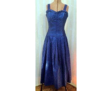 1950's vintage and later, a blue satin textured evening dress with frilled bodice and drop waist, a black silk cocktail dress