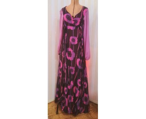 Vintage 1960's/70's, a maxi dress in black and purple with printed poppies, sweetheart neckline, balloon sleeves, elasticated