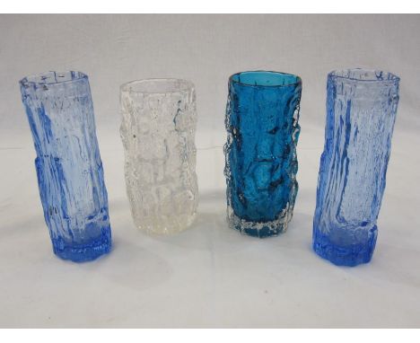 Whitefriars clear glass bark-effect vase, 14cm high, another in turquoise, 15cm high and a pair of light blue textured vases,