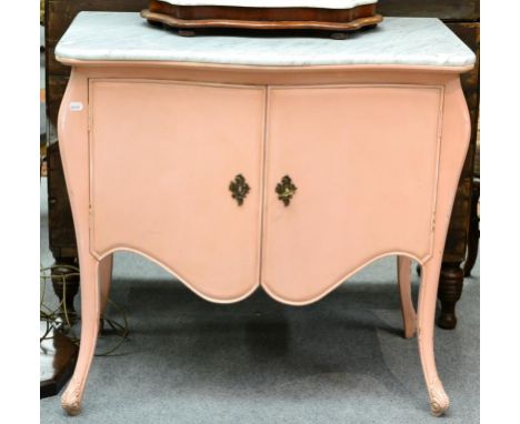 A 19th Century Marble Top Commode, of bombé shaped form, repainted pink with a grey and white serpentine shaped marble top ab