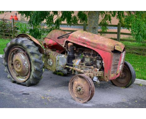 Ferguson TE20 Four Cylinder TVO Petrol Parafin Tractor, painted red  (a/f)  The Ferguson TE20 is an agricultural tractor desi