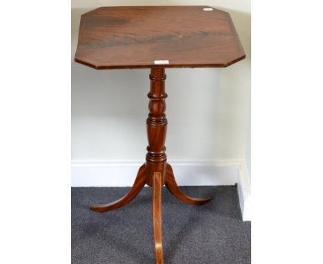 A Regency Mahogany Tripod Table, early 19th century, the crossbanded octagonal shaped top raised on a turned vasi-form suppor