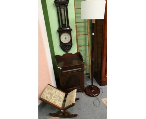 ^ A Victorian Mahogany Bedside Cupboard, with a three-quarter gallery above a frieze drawer with cupboard door below, 51cm wi